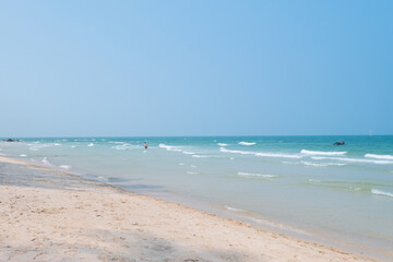 Beautiful tropical beach with white sand and blue sky.