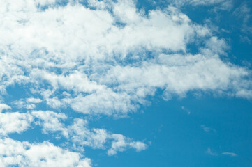 blue sky and clouds close up view from below