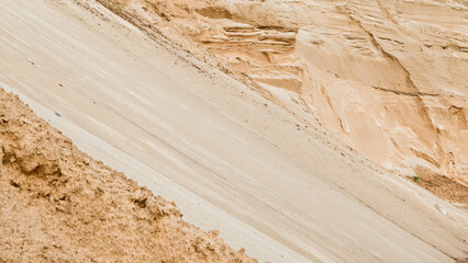 sand quarry, in the photo there is a close-up of sand in the quarry