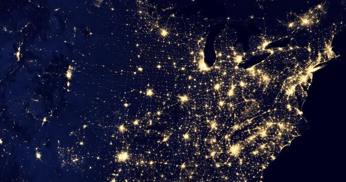 The bright lights of night cities in the USA, as seen from an orbiting satellite. Night map of the northeast coast of the United States. Elements of this image courtesy of NASA.