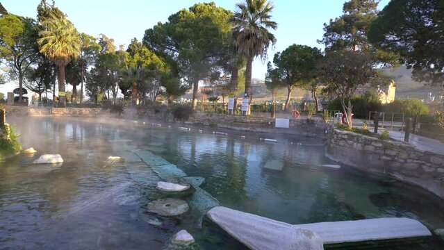 The Antique pool (Cleopatra's Bath) view in Pamukkale. It's a popular touristic destination during a Pamukkale visit
