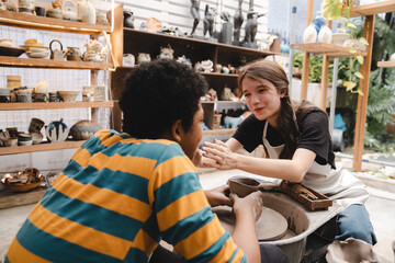 handcraft artist person using art skill of creativity to making ceramic clay craft pottery workshop by hand finger, wet and dirty work with mud for shape bowl traditional in hobby or manufacturing