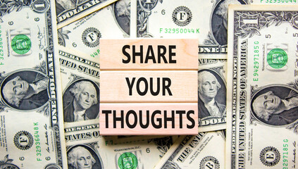 Share your thoughts symbol. Concept words Share your thoughts on beautiful wooden blocks. Dollar...
