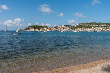 beach view to port de Soller bay with boats on a sunny day