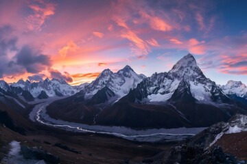 Majestic Mountain Peaks Bathed in the Warm Glow of a Vibrant Sunset Sky