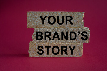 Concept words Your brand's story on beautiful brick blocks. Beautiful red background. Business branding your brand story concept.