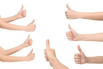 Female hands showing a thumb-up sign meaning approval from different angles, isolated on...