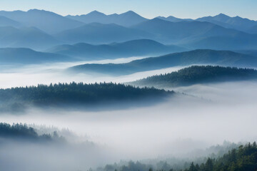 Mist-engulfed peaks rise above a dense forest. Morning fog