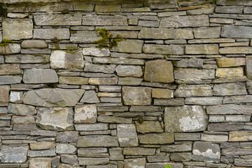 close up  old stonewall texture , stacked rectangular stones