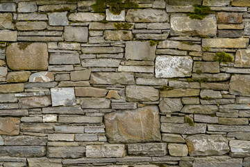 close up  old stonewall texture , stacked rectangular stones