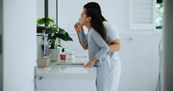 Oral health, brushing teeth and mother with girl, hygiene and morning routine with wellness. Family, home and mama with daughter and dental care with development and bonding with cleaning and parent