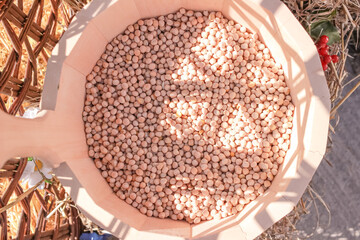 wooden bucket with dry peas. Food growing and harvest concept