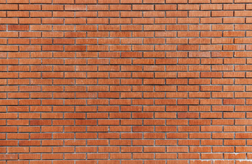 Red brick wall, front view, background texture