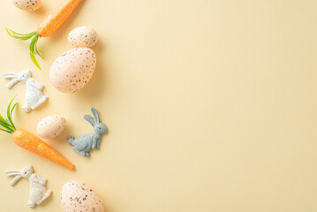 Cozy Easter theme. Top view photo featuring Easter hare decor, a variety of eggs, and decorative carrots on a light beige backdrop, leaving ample space for text or advertisements