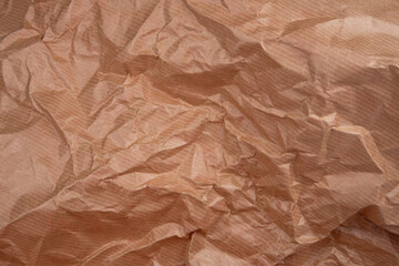 Fototapeta premium Сrumpled paper texture brown. Texture of crumpled paper. Crumpled paper. Wrinkles paper.