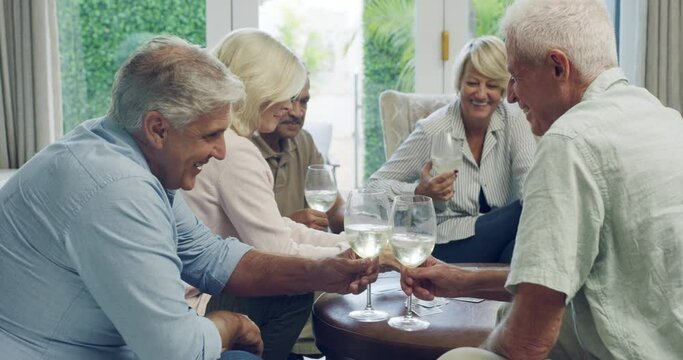 Elderly, friend group and playing cards in home or drinking wine for reunion party, weekend or celebration. Man, woman and community game in living room for fun retirement connection, bonding or joy