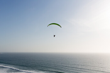 Paraglider over the sea