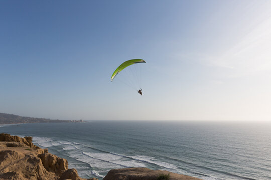Paraglider over the sea