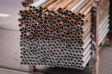 Big stack of iron bars used in road construction and tram rail reconstruction - 741017021