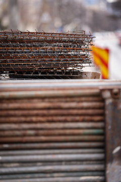 Big stack of iron bars used in road construction and tram rail reconstruction