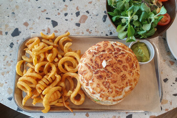 vegan burger with potato curls