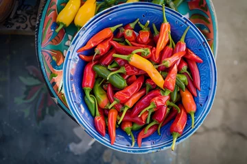 Foto op Plexiglas top view hot chili peppers, mexican cuisine © Marina Varnava