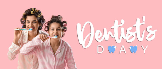 Little girl and her mother with hair curlers in pajamas brushing teeth on pink background