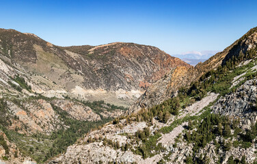Panoramic Sierra Nevada Mountains landscape and forested canyon in California, USA.  