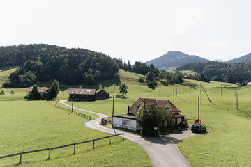 A view of the mountainous area in Switzerland. Mountains and small houses in Switzerland