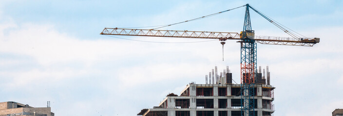 Construction of a new skyscraper and a crane