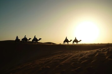 Silhouette people riding camels in desert native tuareg arabic african person Sahara wildlife tourist attraction Dubai arab tour sunset caravan adventure long journey tour dune sun Bible story Quran