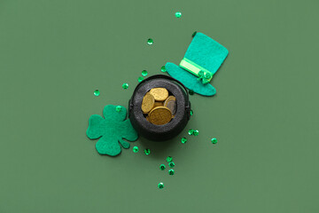 Pot with golden coins and decor on green background. St. Patrick's Day celebration