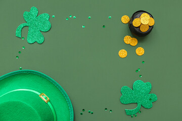 Frame made of pot with golden coins, leprechaun hat and decor on green background. St. Patrick's...