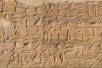 ancient egyptian hieroglyphics at tombs of nobles, Aswan, Egypt 