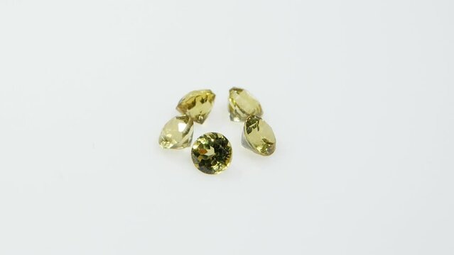 natural yellow mali garnet on the white background