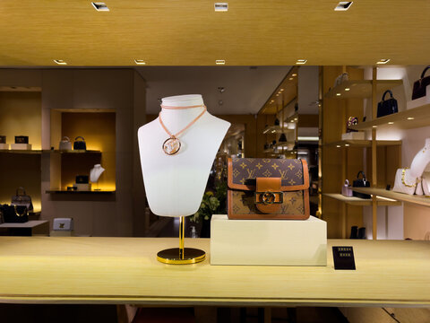 Strasbourg, France - Dec 25, 2023: luxury shopping with exquisite Louis Vuitton necklace and bag, priced at euro 2800 and eur 840 respectively, adding elegance and sophistication to your wardrobe.