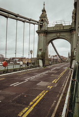Hammersmith Bridge over the River Thames. One of the world's oldest suspension bridges and a major river crossing and primary route in west london, Space for text, Selective focus.