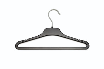 Empty black hanger isolated on a white background. Potential copy space above and inside clothes hangers. Coat hanger close up. A clothes rack is empty without clothes in the middle of the frame