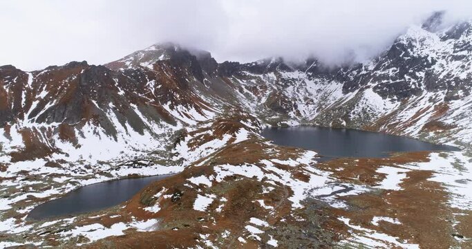 High altitude aerial drone shot of Satania dolinka hiking area and Hincovo pleso lakes in High Tatras mountains