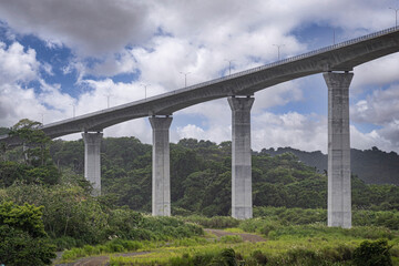 Panama Canal, Panama - July 24, 2023: Atlantic Bridge modern pillar construction just out of canal,...