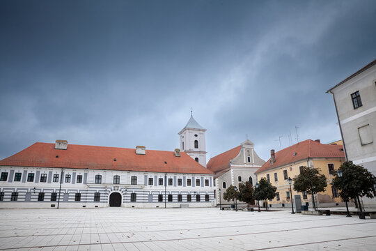 Panorama of the Trg Vatroslava Lisinskog square with the Franciscan Monastery of Osijek, in Osijecka tvrdja, the osijek fortress. It's a roman catholic monastery and a landmark of Croatia.