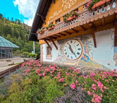 Charming German Bavarian style chalet with large cuckoo clock face on the front. Located within the High Black Forest in Breitnau, Baden-W&uuml;rttemberg Germany.
