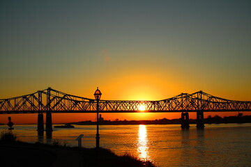Sunset through Natchez-Vidalia bridge in Mississippi