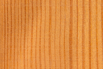A close-up of a textured wooden surface with natural patterns