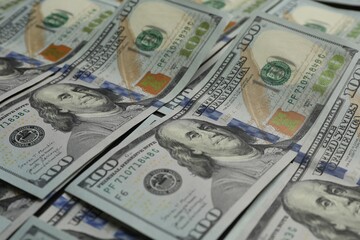 Money exchange. Dollar banknotes as background, closeup