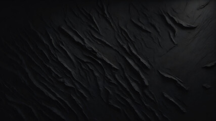 Black textured wall. Close-up, black background
