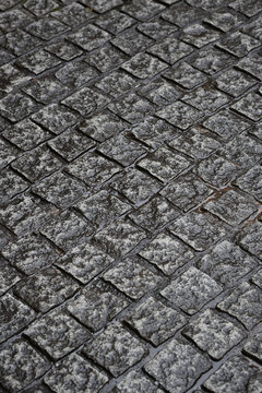 雨に濡れた石畳の地面 © tkpho