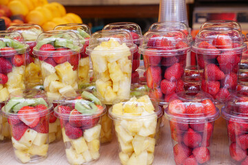 mixed fruits in a plastic jar selling at istanbul street .