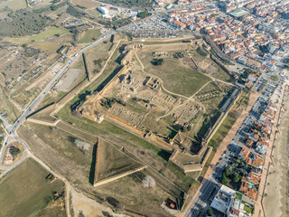 Panoramic aerial view of Roses citadel in Spain , giant pentagonal star fort fortress with bastions...