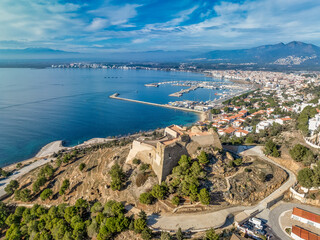 Luxury single family and apartment vacation houses surround Trinity Fort in Roses Spain with deep...